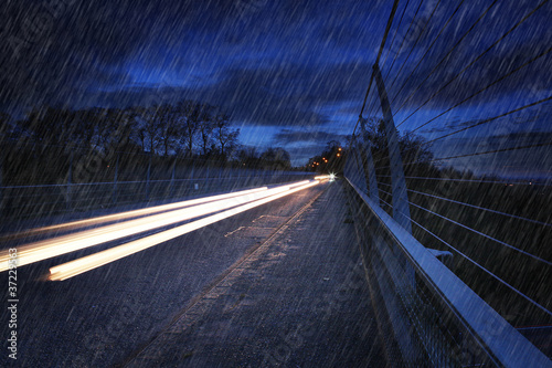Photo: headlight trails raining headlight trails raining