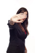 Young businesswoman making stop sign