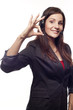 Woman operator with headset showing hand ok sign