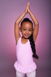 Cute little African American girl dancing