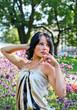 Erotic pose of model in park