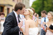 Beautiful bride and groom kissing