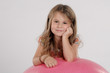 Little girl smiling at the camera