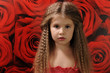 Little cute girl with curly hairs