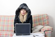 canvas print picture - A cold woman is still working at home