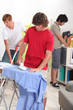 Young men doing their household chores