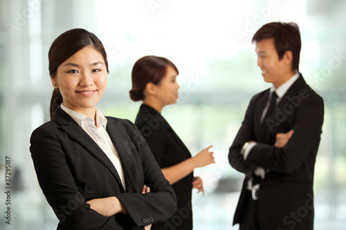 Photo: Business woman in a corportate environment Business woman in a corportate environment