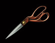 closed scissors on black