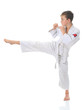 Young boy training karate.