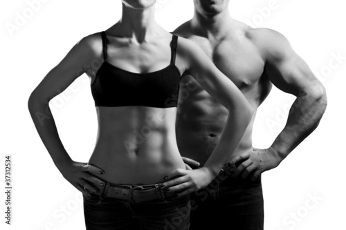 Foto: man and a woman in the gym man and a woman in the gym