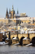 Romantic Snowy Prague gothic Castle with the Charles Bridge Romantic Snowy Prague gothic Castle with the Charles Bridge