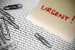 Blah Blah Blah Text with Urgent Sticky Note and Paper Clips