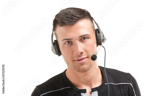Photo: Portrait of a businessman working in a call center Portrait of a businessman working in a call center