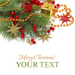 Photo: Xmas background - Christmas decoration, green branch, red stars Xmas background - Christmas decoration, green branch, red stars