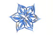 Blue star made of paper on white background