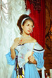 A girl in a ball gown.