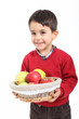Photo: Child bring basket fruit Child bring basket fruit