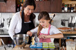Mother and daughter baking at home Mother and daughter baking at home