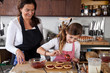 Mother and daughter baking at home Mother and daughter baking at home