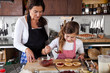 Mother and daughter baking at home Mother and daughter baking at home