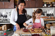 Mother and daughter baking at home Mother and daughter baking at home