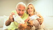 Senior Couple Playing Electronic Games Senior Couple Playing Electronic Games