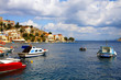 Small boats and houses on symi island, Greece.. Small boats and houses on symi island, Greece..