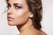 Beautiful woman model with fashion makeup, wavy hairstyle