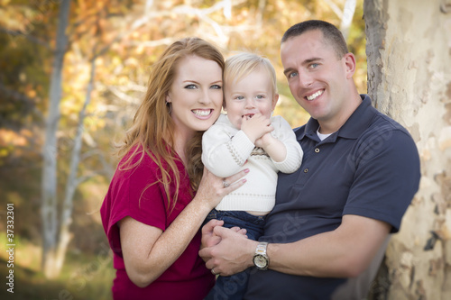 Photo: Young Attractive Parents and Child Portrait Young Attractive Parents and Child Portrait