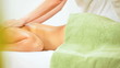 Brunette Client Receiving Body Massage at Spa Club