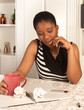 Pensive woman writing