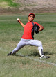 Baseball player throws a ball down the line with force