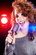 Rock star.Sexy Girl singing in retro mic Rock star.Sexy Girl singing in retro mic