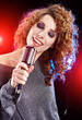 Rock star.Sexy Girl singing in retro mic Rock star.Sexy Girl singing in retro mic