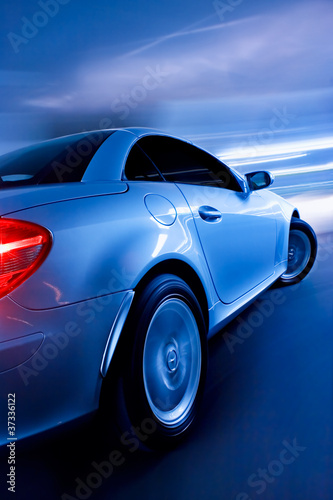 Photo: Fast Sports Car with Motion Blur Fast Sports Car with Motion Blur