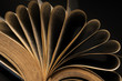 pages of books isolated on black background