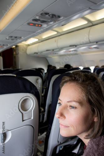 Photo: femme dans l'avion femme dans l'avion