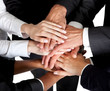 Closeup of mixed hands stacked together