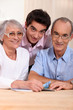 portrait of grandparents with grandson