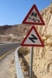 Dangerous Curves Ahead - traffic sign at the desert