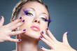 Bright violet makeup and manicure