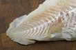 Raw Cod on a wooden butcher