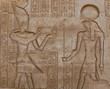 Egyptian engraved gods on wall in Kom Ombo temple, Egypt