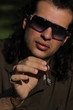 Person Smoking a Cigar