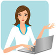 Attractive business woman working on her laptop computer
