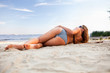girl lying on a beach