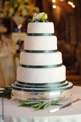 Photo: Green and white wedding cake. Green and white wedding cake.