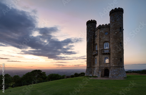Photo: Broadway Tower with valley view after sunset Cotswolds, UK Broadway Tower with valley view after sunset Cotswolds, UK