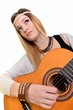 An attractive young teenage woman with an acoustic guitar An attractive young teenage woman with an acoustic guitar