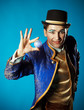 Portrait of wizard in a blue jacket with a magic ball.